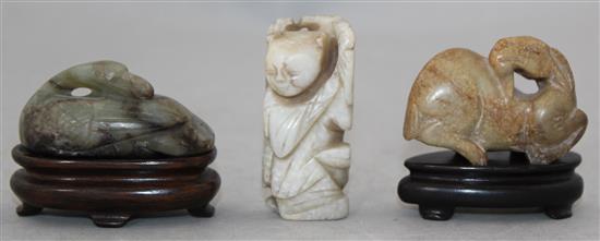 Two Chinese jade figures and a soapstone figure of a recumbent ram,